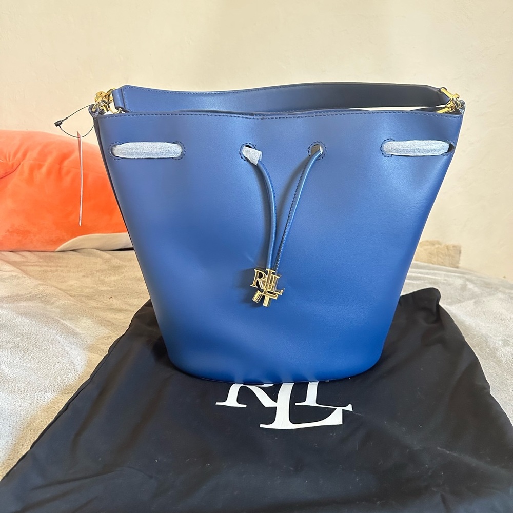 Ralph Lauren's Andie bucket bag in summer blue color, new with tags and dust bag